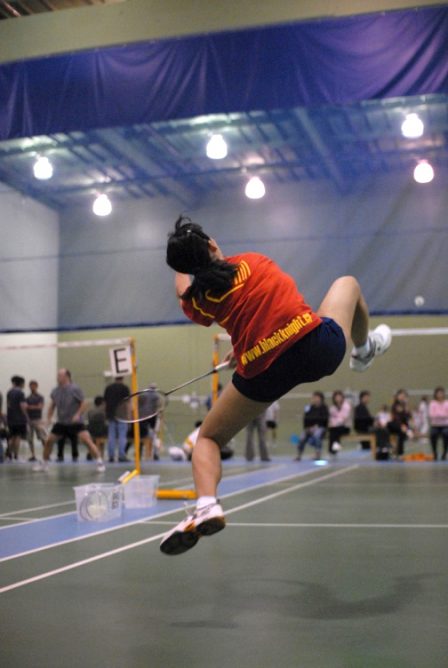 badminton player in the air